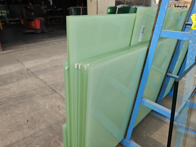 Green printed ceramic frit glass panel